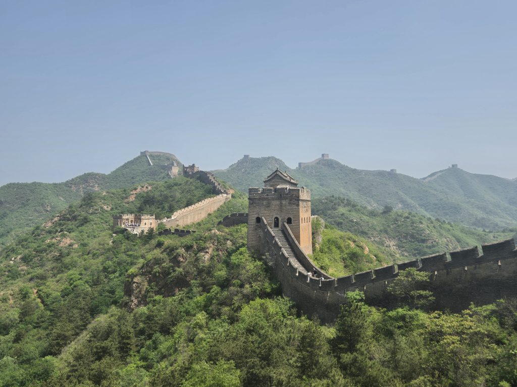 Image of the Great Wall of China showing the wall itself and view from above