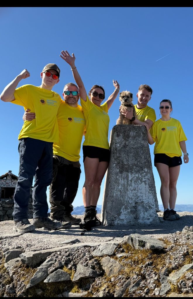 Maria Lumsden with (from left) cousins Ben and Dayle, son Harry and daughter Jess and Dotty at Ben Nevis summit.