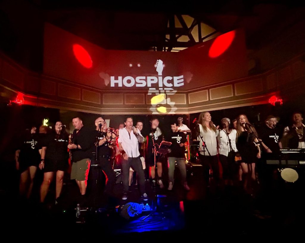 Photo of performers lined up on stage