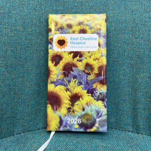 Photo of 2025-2026 diary with sunflowers pattern and East Cheshire Hospice logo