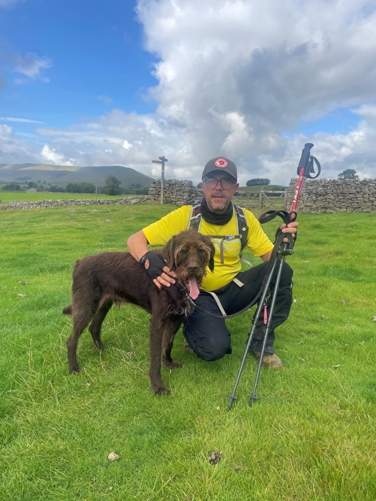 Simon pictured with his dog Red.