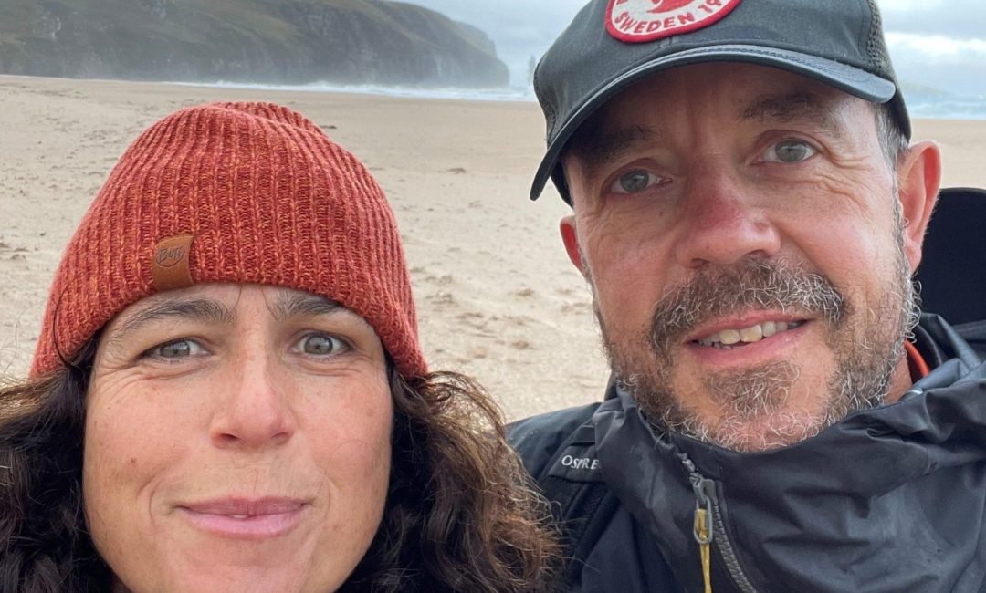 Photo of a man and a woman on a beach