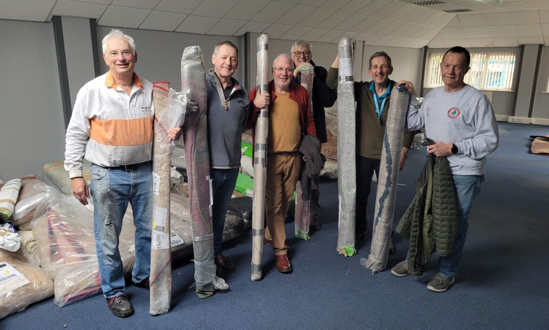 Volunteer-and-Rugs-scaled